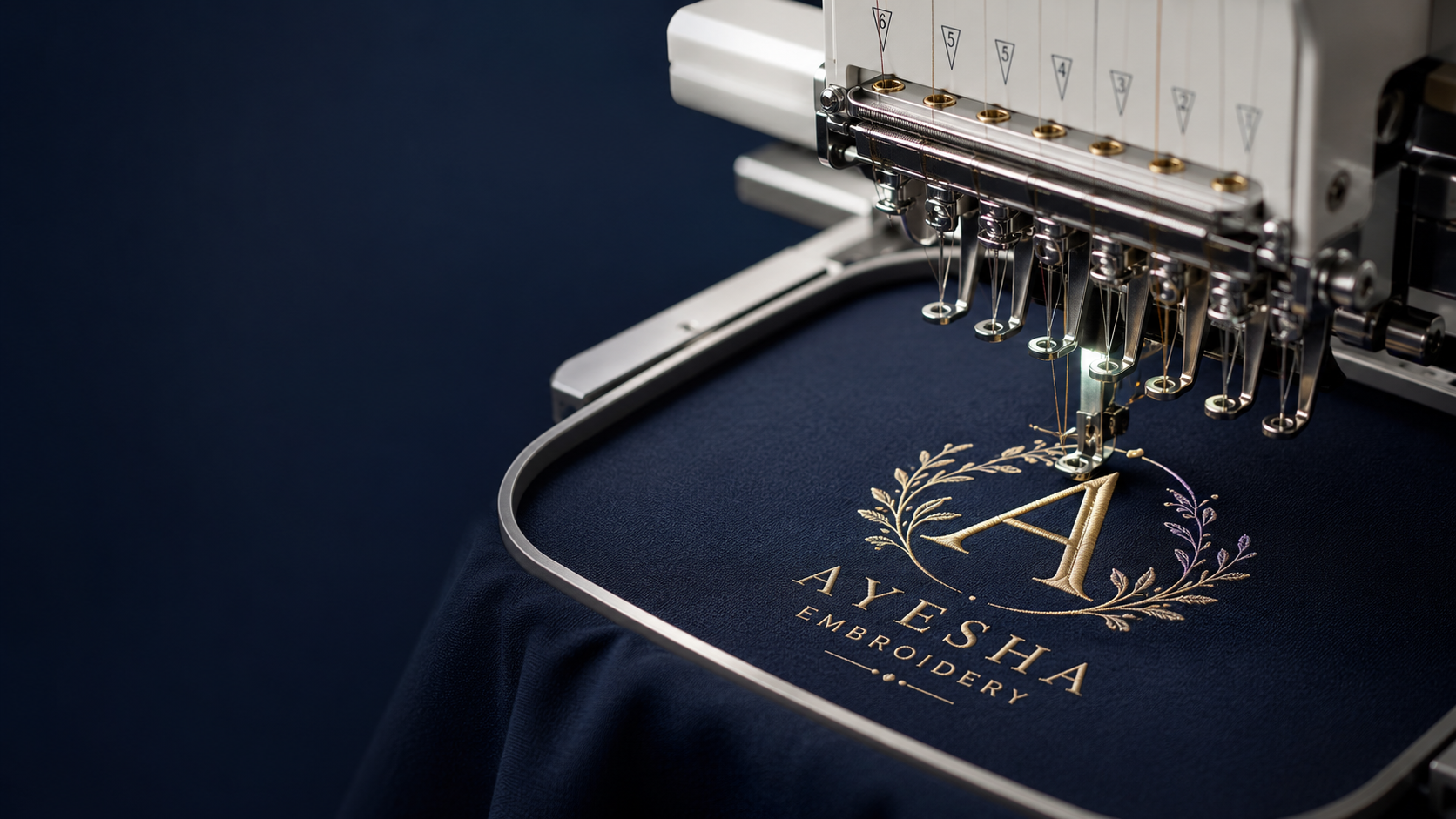 Close-up of embroidery stitching on a navy garment